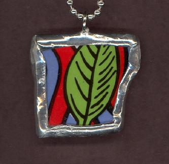 hand soldered bold graphic olive green leaf pendant